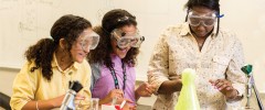 girls working on chemistry experiment