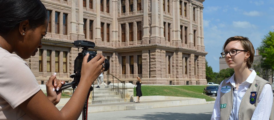 Press Corps A member of our Press Corps troop – reporting live from the Texas State Capitol