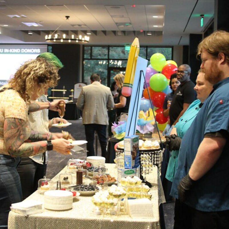 Sampling pastries at Cookies, Cocktails, and Confection