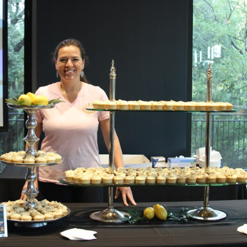 Woman smiling with pastries
